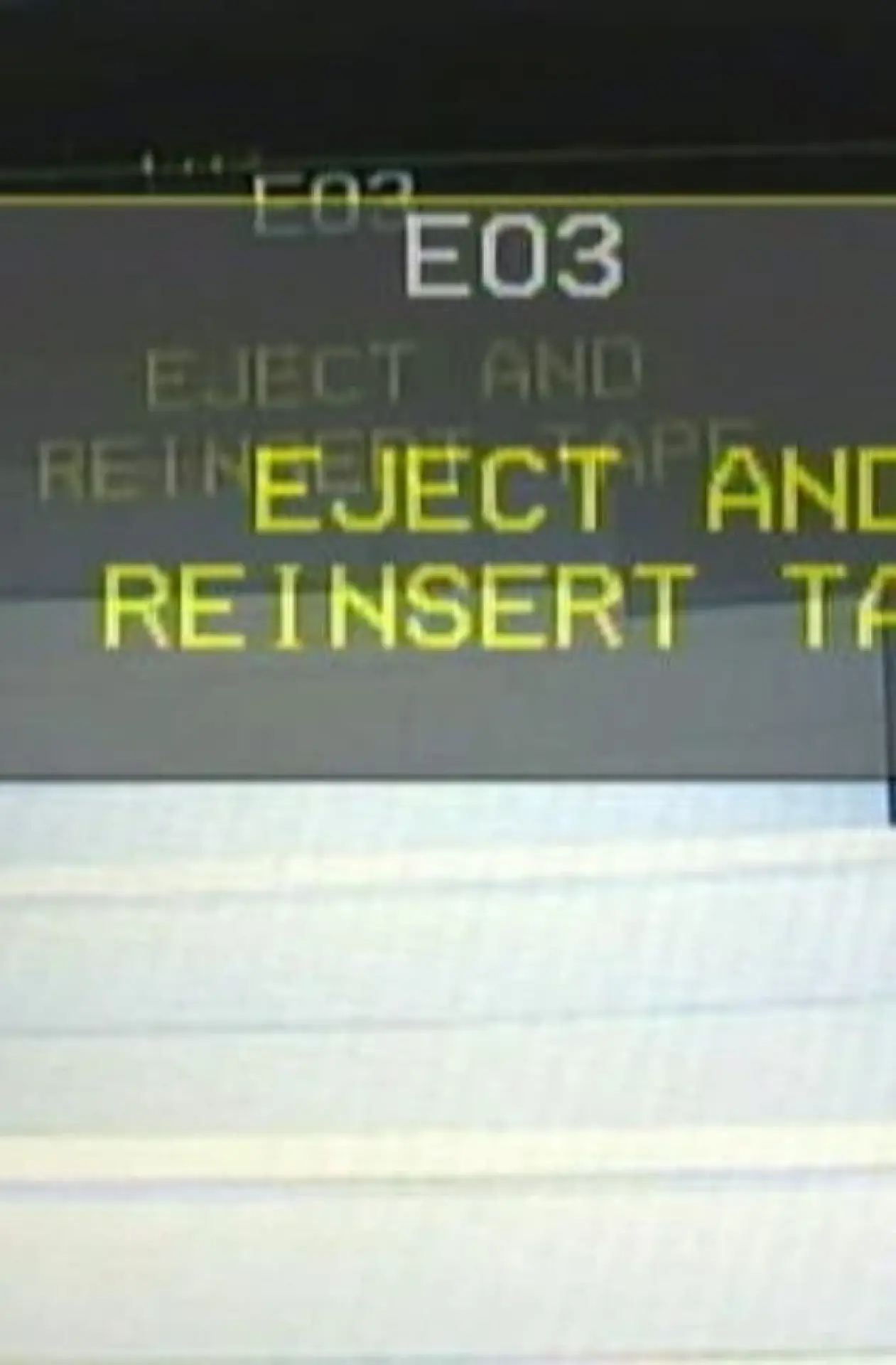 Plakat filmowy "EJECT AND REINSERT TAPE"