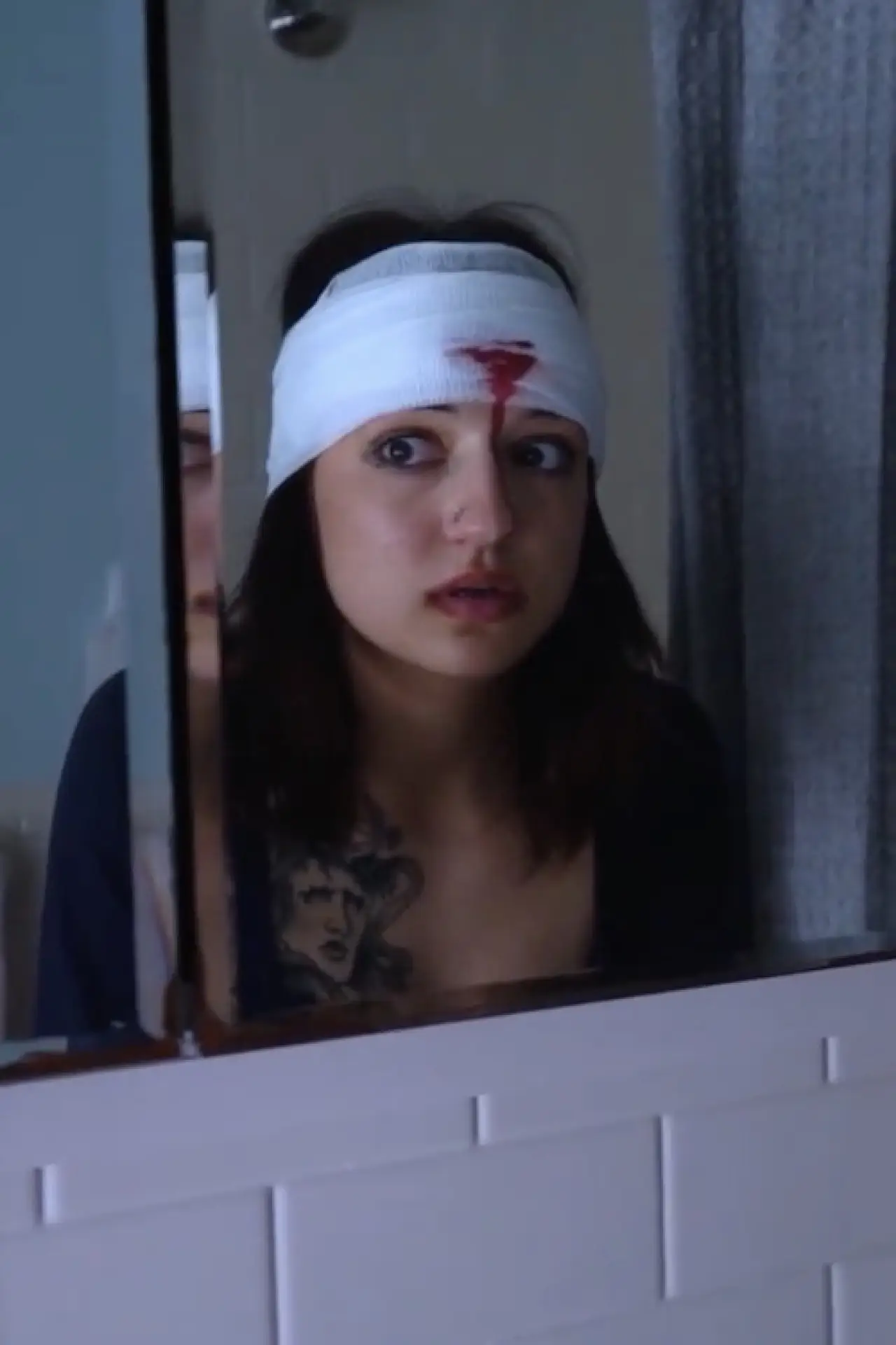 Plakat filmowy "Woman Under Wound"