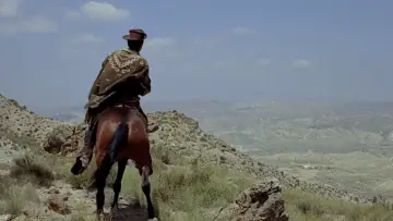 Zasłona do filmu "Za kilka dolarów więcej" #629347