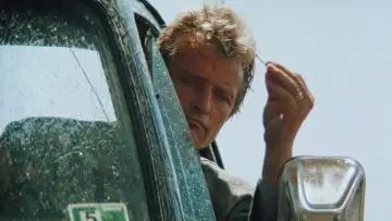 Zasłona do filmu "Autostopowicz" #993217