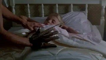 Zasłona do filmu "Koszmar z Ulicy Wiązów 2: Zemsta Freddy