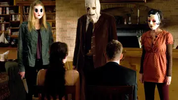 Zasłona do filmu "Nieznajomi" #685622