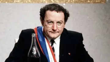 Zasłona do filmu "Coluche, la véritable histoire d