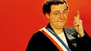 Zasłona do filmu "Coluche, la véritable histoire d