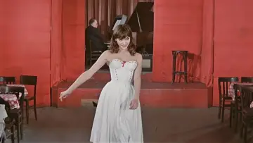 Zasłona do filmu "Kobieta jest kobietą" #220634