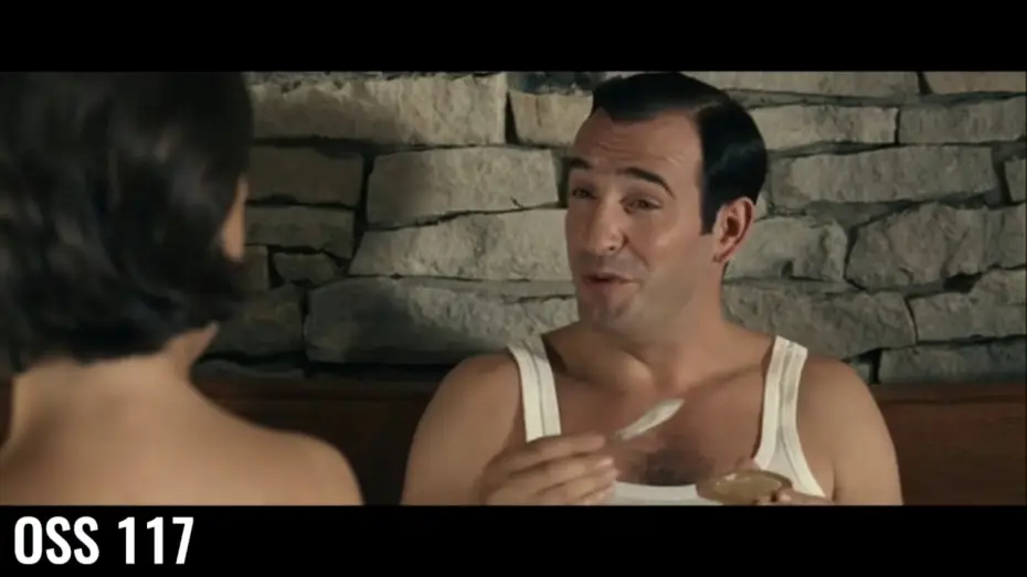 Wideo do filmu OSS 117 - Kair, gniazdo szpiegów — OSS 117 - Le Caire nid d'espion - Scène culte - J'aime me beurrer la biscotte !